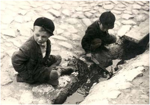 Children play in Warsaw ghetto, Poland 