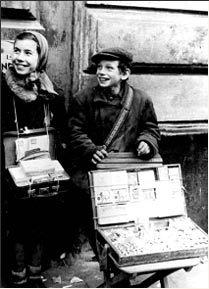 Children selling cigarettes in the Warsaw Ghetto, Poland.